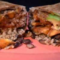 Vegan Plantain Burrito · Fried plantain,  black beans, brown rice, salsa fresca, avocado, molcajete sauce in a whole ...