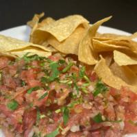 Chips & Salsa Fresca · Homemade pieces of corn tortillas  with salsa pico de gallo