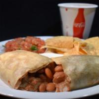Kids Beans and Cheese Burrito · A medium size flour tortilla Burrito with melted cheese & whole beans (ask for refried beans...