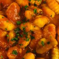 Gnocchi · Potato dumplings in a Marinara Sage Sauce.  Add chicken or prawn (4) for an additional charge.