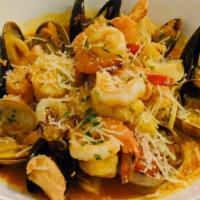 Frutti Di Mare Al Pomodoro · Prawns, scallops, squid, clams, mussels in a tomato sauce. Add pasta with an additional char...