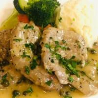 Veal Piccata · Veal scallopini with capers, lemon and butter sauce.