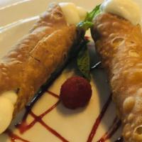 Cannoli · Cannoli filled with ricotta cheese and chocolate chips.