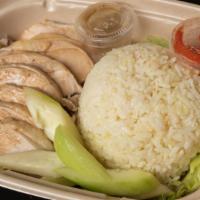 R8. Hainan Boneless Chicken with Rice 海南雞飯 (無骨)  · Combination rice plate - turmeric rice, cucumber, cilantro, steam free range boneless chicke...