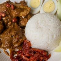 R9. Nasi Lemak Beef Shank or Chicken / 椰漿飯配牛或雞 · Nuts, spicy. Combination rice plate - coconut rice, boiled egg, peanuts, cucumber and sambal...