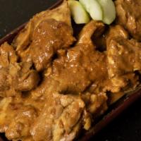 E5. Rendang Chicken / 乾咖哩雞 · Spicy. Malay dry curry, boneless chicken.