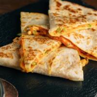 Classic Quesadilla · Our crisp flour tortilla loaded with cheese and your choice of protein.
