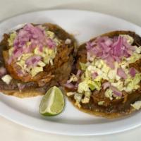 Panuchos Cochinita · Handmade fried tortillas with black bean puree.
Cochinita pork, diced cabbage, onions.
*Sold...