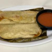 Tamales Chicken · Masa (dough) wrapped in banana leaf, filled with chicken.
*Sold Individually*