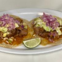 Taco Cochinita · Handmade tortillas
Cochinita pork, diced cabbage, onions
*Sold Individually*