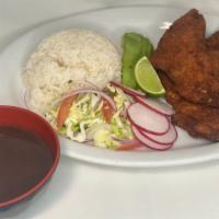 Milanesa · Pork, Beef, Chicken, or Fish Fillet marinated in breadcrumbs and deep-fried. Served with a s...