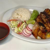 Roasted Ribs · Roasted Ribs marinated in Achiote.
Served with Rice and black beans puree.
Cabbage Salad, Sl...