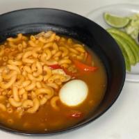Sopa de Coditos / Elbow Soup · Soup with chicken, elbow macaroons, hard-boiled egg, tomato sauce puree, red onion, avocado ...