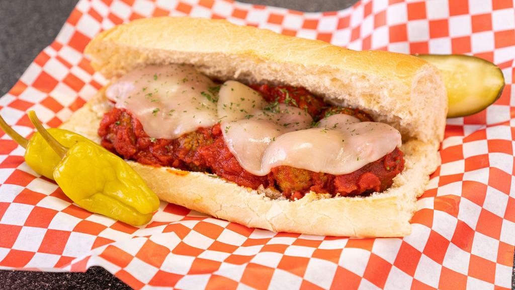 Meatball Marinara · Whole meatballs on a french roll smothered with marinara sauce and topped with melted provolone cheese—served hot.