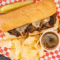 Loaded Tri-Tip · Tender, marinated tri-tip with grilled onion, swiss cheese, and gravy.