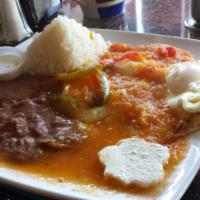 Huevos Rancheros · Eggs smothered in house salsa.
