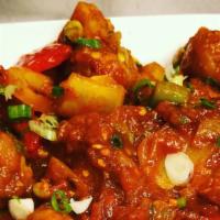 Gobi Manchurian · Cumin Restaurant favorite: Fresh florets of cauliflower battered, fried and cooked with bell...