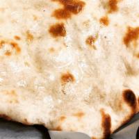 Plain Naan · Teardrop shaped traditional Punjabi white bread baked in tandoor.