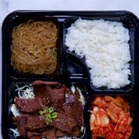 K-BBQ Bento Box · Served with 4 side dishes and steamed rice.