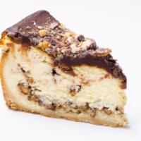 Snickers Bar Cheesecake · Guittard chocolate shell, caramel, perfect shortbread crust, nuts and Snickers Bar chunks......