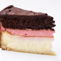 Neapolitan Cheesecake · Deliciously decadent layer cake with original NY Cheesecake, strawberry mousse, and chocolat...