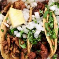 Taco's · Served on corn tortilla with cilantro, onion, and salsa