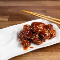 BBQ Chicken Wings (6 Pieces) · Spicy. Chicken wings smothered in sweet & spicy barbecue sauce, 6 pieces
