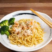 Garlic Butter Lobster · Caribbean lobster meat with garlic butter sauce, served with broccoli