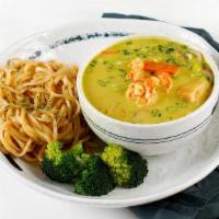 Curry Prawns · Spicy. Yellow curry with coconut milk served with potatoes & carrots served with broccoli