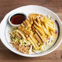 Fried Tofu Cabbage Salad · Veggie. Shredded cabbage, carrots, cucumber & mint leaves, topped with peanuts & fried shall...