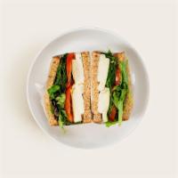Caprese Sandwich · Fresh mozzarella with tomatoes, mixed greens, basil, and balsamic dressing on your choice of...
