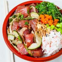 Yuzu Warrior · Ahi tuna, yuzu kosho sauce, crab salad, seaweed salad, edamame, masago, cucumber, green and ...
