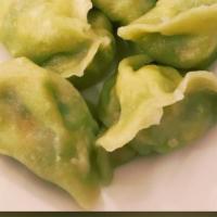 76. Vegetable Boiled Dumplings (8 pcs)（素水饺） · egg and vegetarian