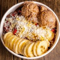 Bliss Bowl · Blended açai, blueberry, banana, raw cashew butter and hemp milk topped with raw superfood t...