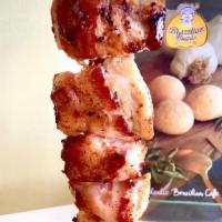 Chicken with. Bacon Single Skewer (Espetinho de Frango com Bacon) · One grilled chicken breast skewer wrapped with bacon