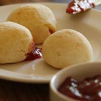 Cheese bread - Pao de Queijo · Bag with 5 units of our signature Brazilian cheese bread (gluten free) freshly baked and rea...