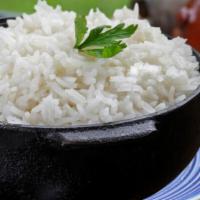 Garlic Rice (Arroz) · White rice made with garlic.