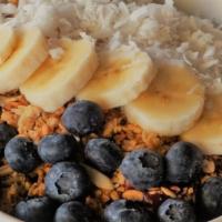 Carmen Miranda Acai Bowl · Organic acaiberry base. 
Topping coconut, blueberries, granolas, bananas. Choose a sauce: pe...