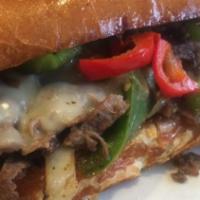 10. Philly Steak · Thinly sliced steak, cheese, peppers ad onions. Served in a bun.