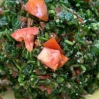 2. Tabouli · Chopped parsley, tomatoes, onions, cracked wheat, lemon juice, and olive oil.