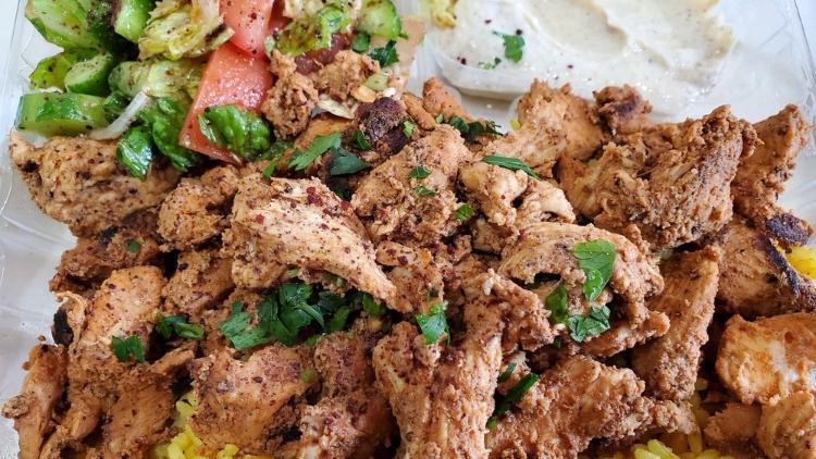 8. Chicken Shawarma · Tender chicken breast thinly sliced, seasoned and marinated with our authentic shawarma spices. Served with our garlic sauce.