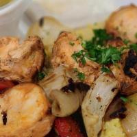 14. Souvlaki Chicken · Skinless kebobs of chicken breast, charbroiled to perfection marinated in our specially sele...