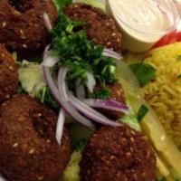 5. Falafel Vegan (6 Pcs.) · Crushed chickpeas and fava beans, seasoned with cumin and coriander, fried to golden perfect...