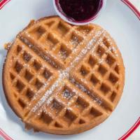 Belgian Waffle · Our waffle with syrup and butter, dusted with powdered cinnamon sugar.