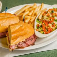 French Dip · Thinly sliced roast beef on a French roll with Monterey Jack cheese. Served with au jus.