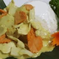 45. YELLOW CURRY · Potatoes, carrots and onions in Thai yellow curry with coconut milk.