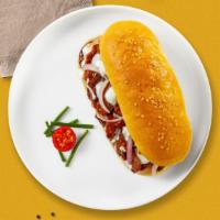 Buffalo Cheesesteak · Thinly cut meat of your choice, buffalo sauce and melted cheese. Served on a French roll.