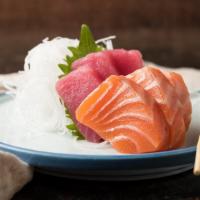 Sashimi Appetizers (6 Pieces) · Three pieces of tuna and three pieces of salmon.