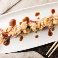Crazy Scallop · Spicy, raw fish. Crab, shrimp tempura topped tuna, salmon, shrimp, avocado, spicy scallop wi...