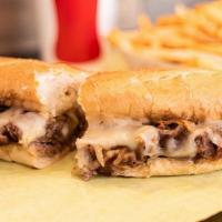 Theo's Cheesesteak · Original steak sandwich with grilled onions and cheese.